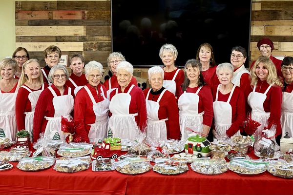 Assistance League Member group photo at Yule Boutique