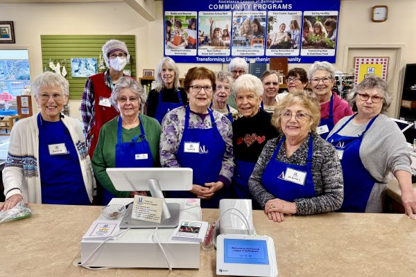 Assistance League member volunteers ready for a busy day