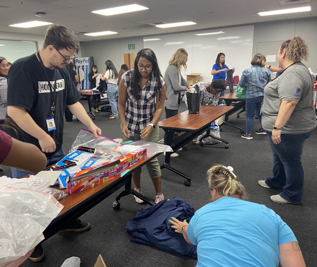 PayPal Volunteers packaging Assault Survivor Kits | Assistance League ...