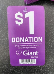 Image of the $1 donation tag on the Giant Tote Bag