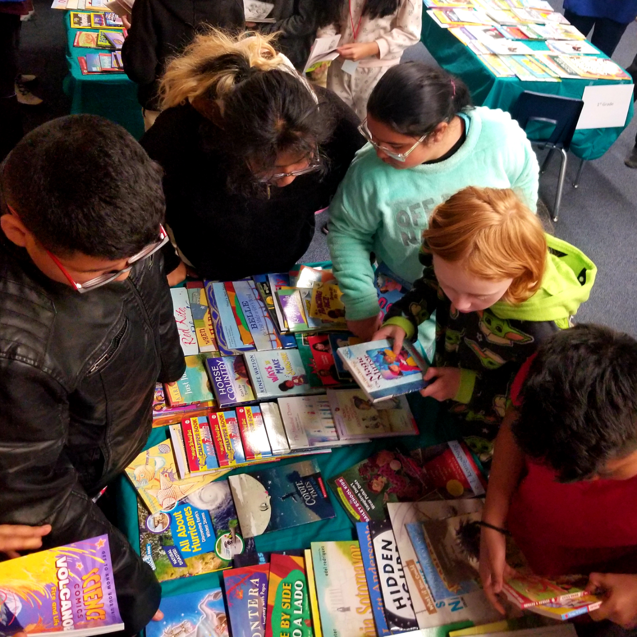 students picking books