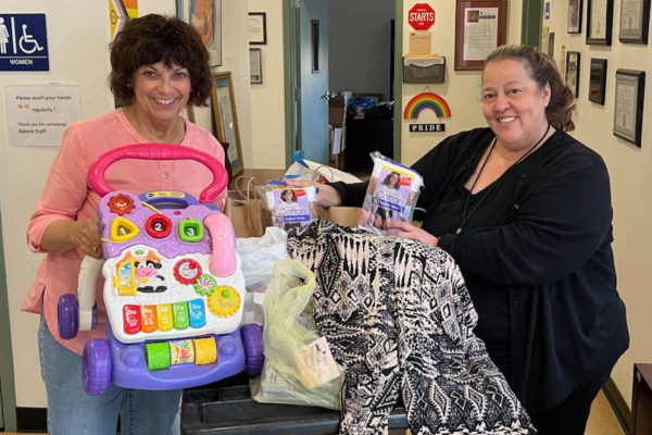 Delivery of clothing and toys to Parisi House on the Hill